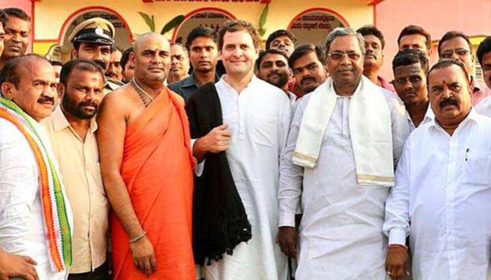कर्नाटक चुनावः मठों की राजनीति में राहुल से पिछड़े अमित शाह