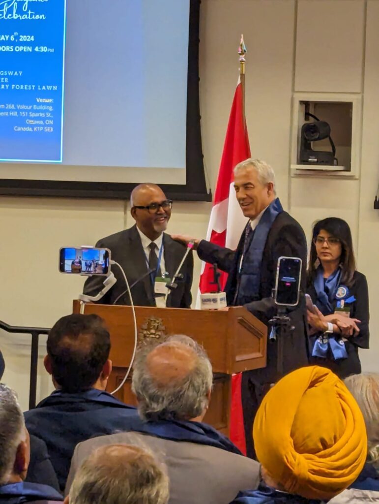 Chetna association general secretary Jai Birdi with MP Don Davies (Vancouver Kingsway)